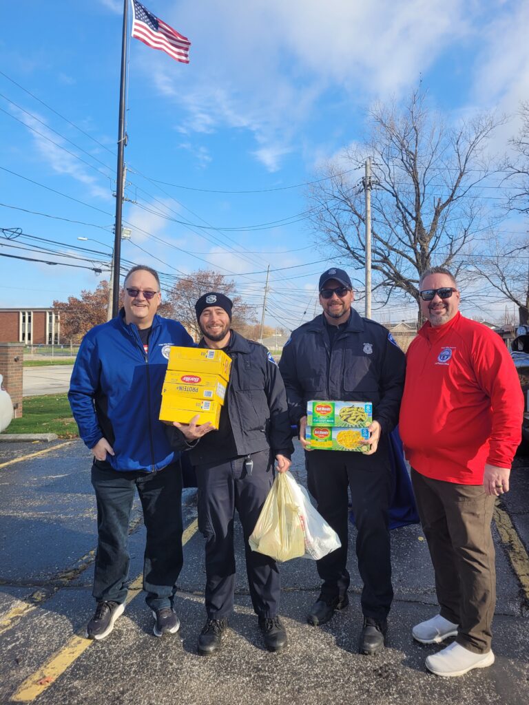 Judge Mike DeLeone and Chief Probation Officer Frank Zupancic dropping off donations for the Wickliffe Police Department’s “Fill the Cruiser” event